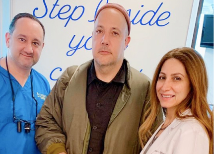Picture of Dr. Maz Ebrahimi with his patients